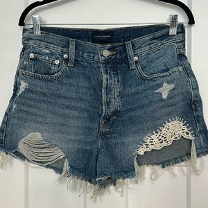 Lucky brand cutoff denim shorts with crochet detail.